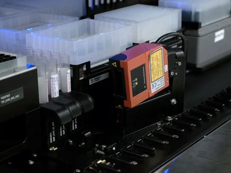 High-throughput, Automated Extraction of DNA and RNA from Clinical Samples using TruTip Technology on Common Liquid Handling Robots