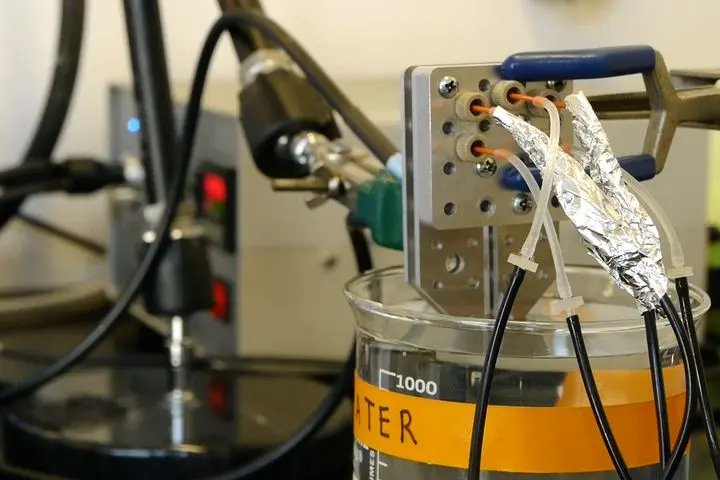 Microfluidic Fabrication of Polymeric and Biohybrid Fibers with Predesigned Size and Shape