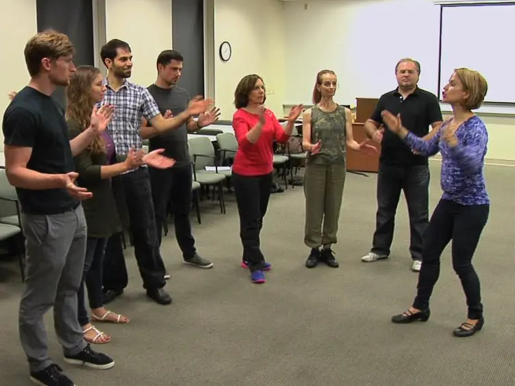 Community-based Adapted Tango Dancing for Individuals with Parkinson's Disease and Older Adults