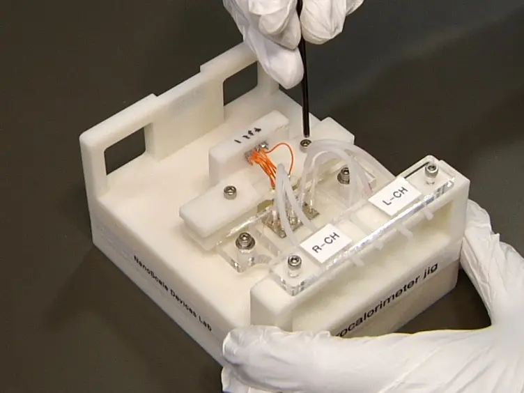 Thermal Measurement Techniques in Analytical Microfluidic Devices