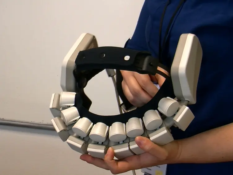 Using Fiberless, Wearable fNIRS to Monitor Brain Activity in Real-world Cognitive Tasks