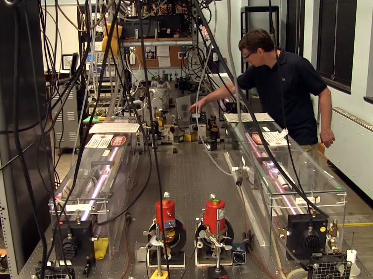 Characterizing Far-infrared Laser Emissions and the Measurement of Their Frequencies