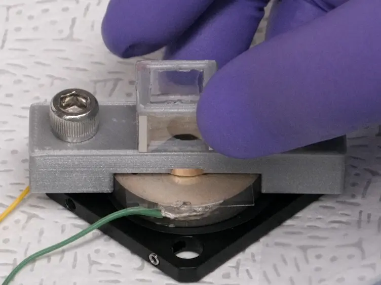 Optical Trap Loading of Dielectric Microparticles In Air