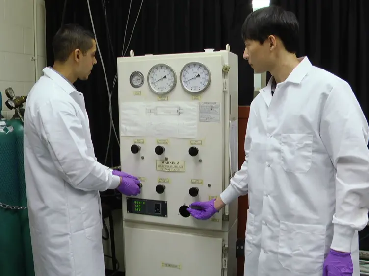 Conducting Elevated Temperature Normal and Combined Pressure-Shear Plate Impact Experiments Via a Breech-end Sabot Heater System