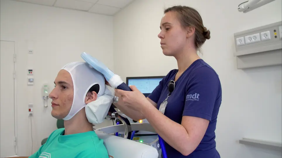 Conventional and Threshold-Tracking Transcranial Magnetic Stimulation Tests for Single-handed Operation